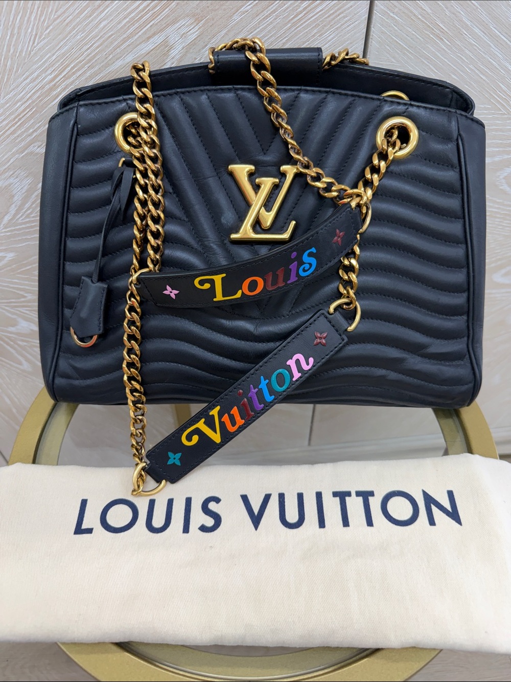 Louis Vuitton Black Quilted Shoulder Bag with Gold Accents